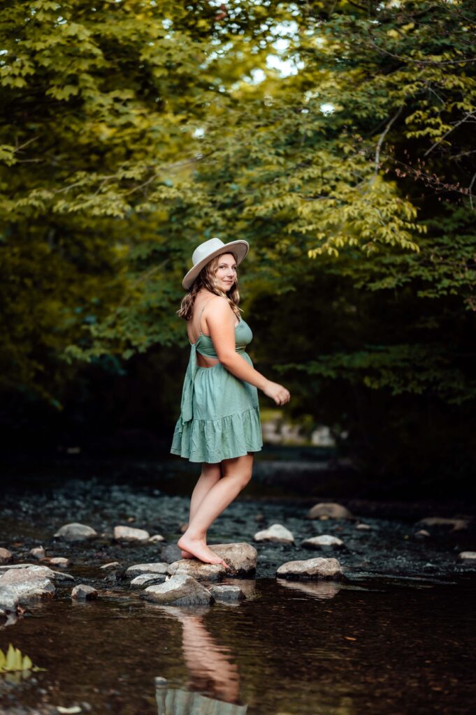 JMR_1237-Edit | Two Wild Souls Photography Barefoot senior portrait on the rocks of Stoney Creek at Van Hoosen Farm