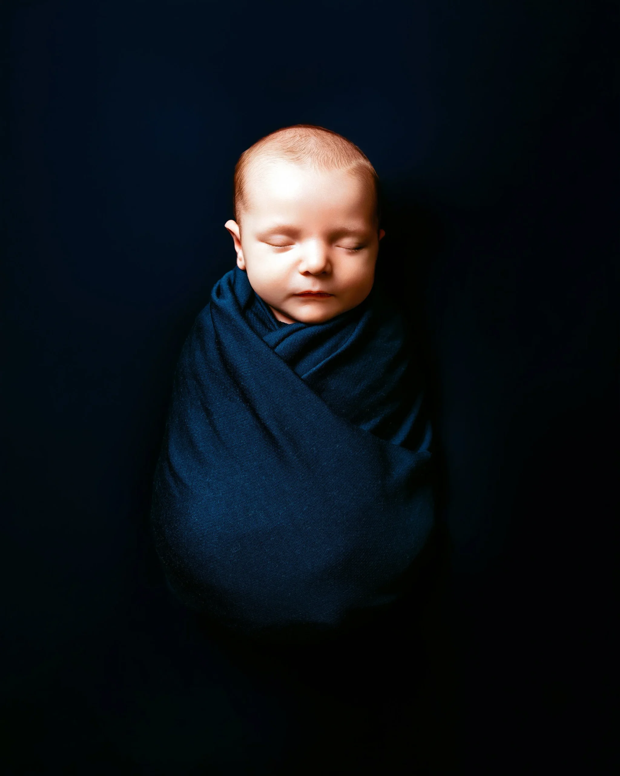 Why Metro Detroit Parents Splurge on Luxury Newborn Photography (And What They Get)